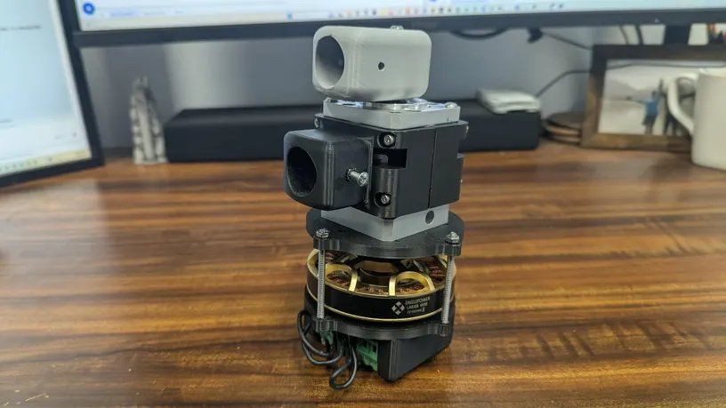 Romulus M2 planetary actuator standing on a desk.